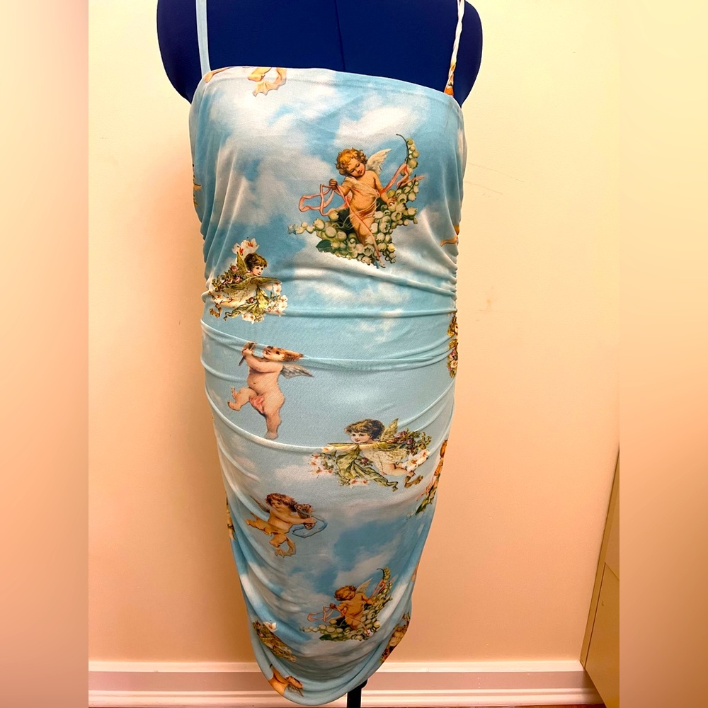 Love is in the air! Form fitting attention getter dress!